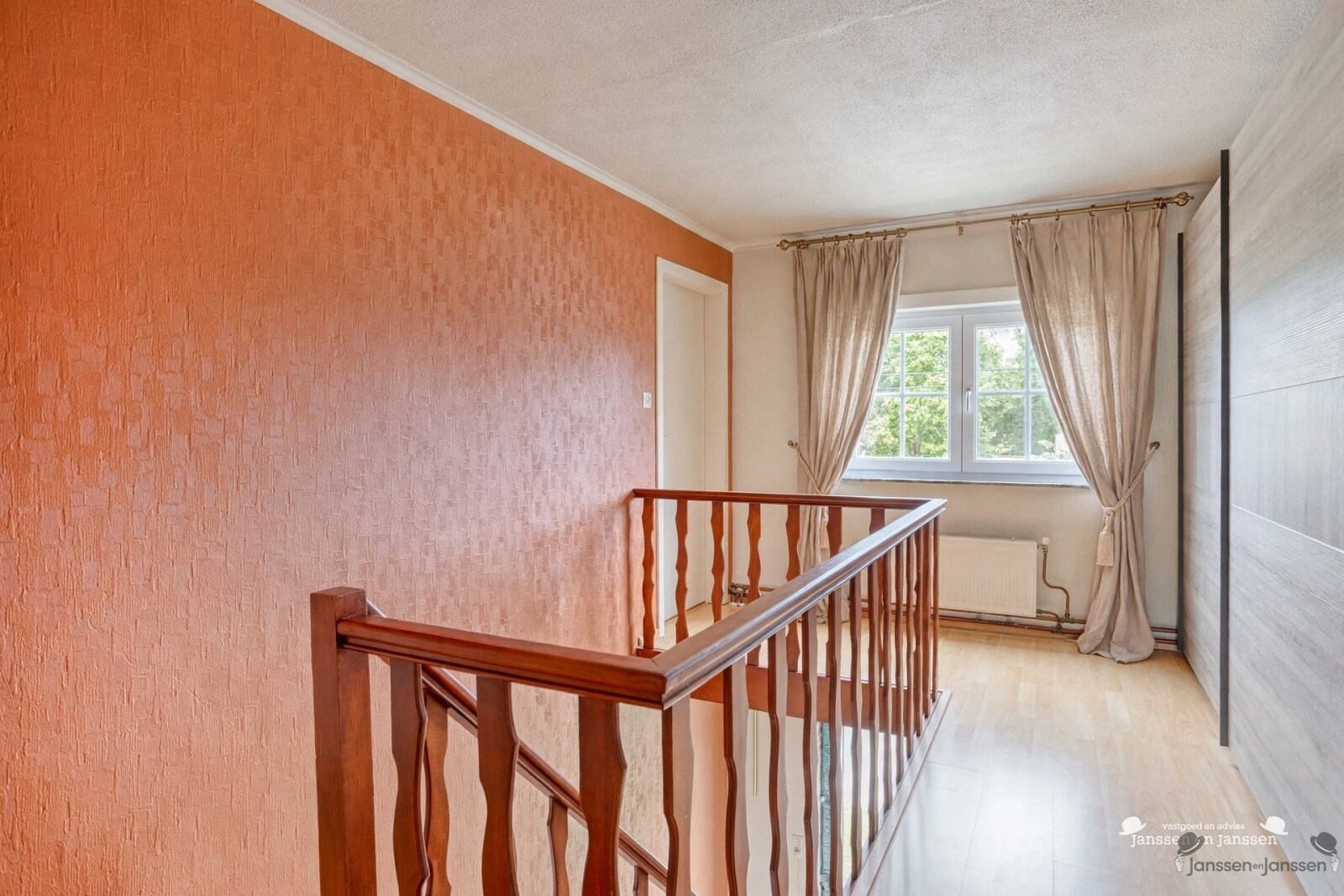 hallway-landing-with-wooden-railing