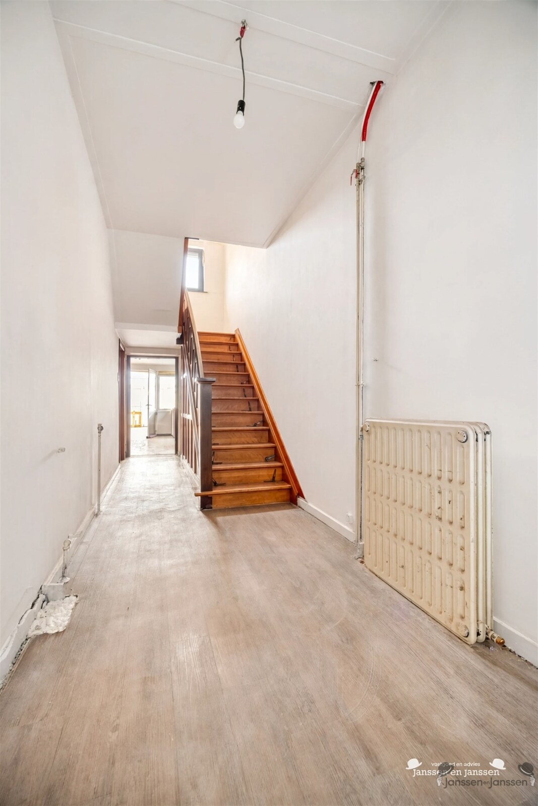 empty-hallway-with-wooden-stairs